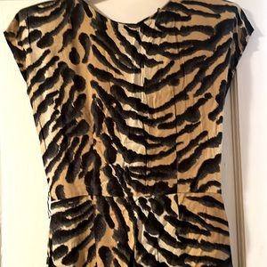 Tiger dress size 11/12. Stunning! Needs a stitch in back & on shoulder pad.